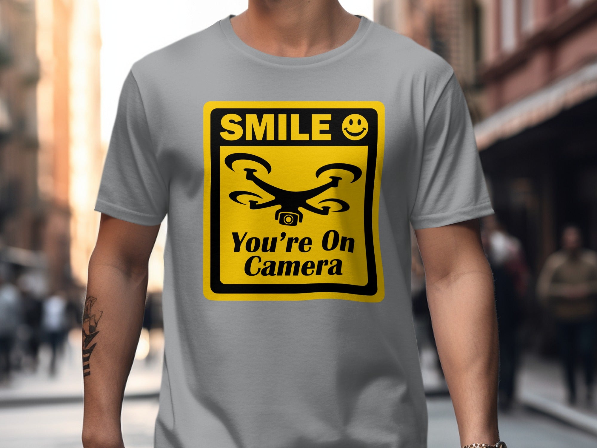 Smile You're On Camera Unisex Softstyle T-Shirt, Cute Drone Tee, Humorous Quadcopter Shirt, Great Gift for Drone Lovers