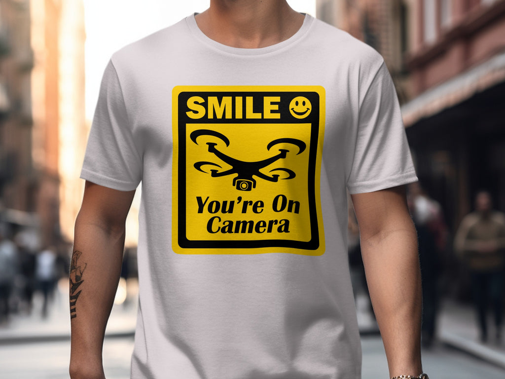 Smile You're On Camera Unisex Softstyle T-Shirt, Cute Drone Tee, Humorous Quadcopter Shirt, Great Gift for Drone Lovers