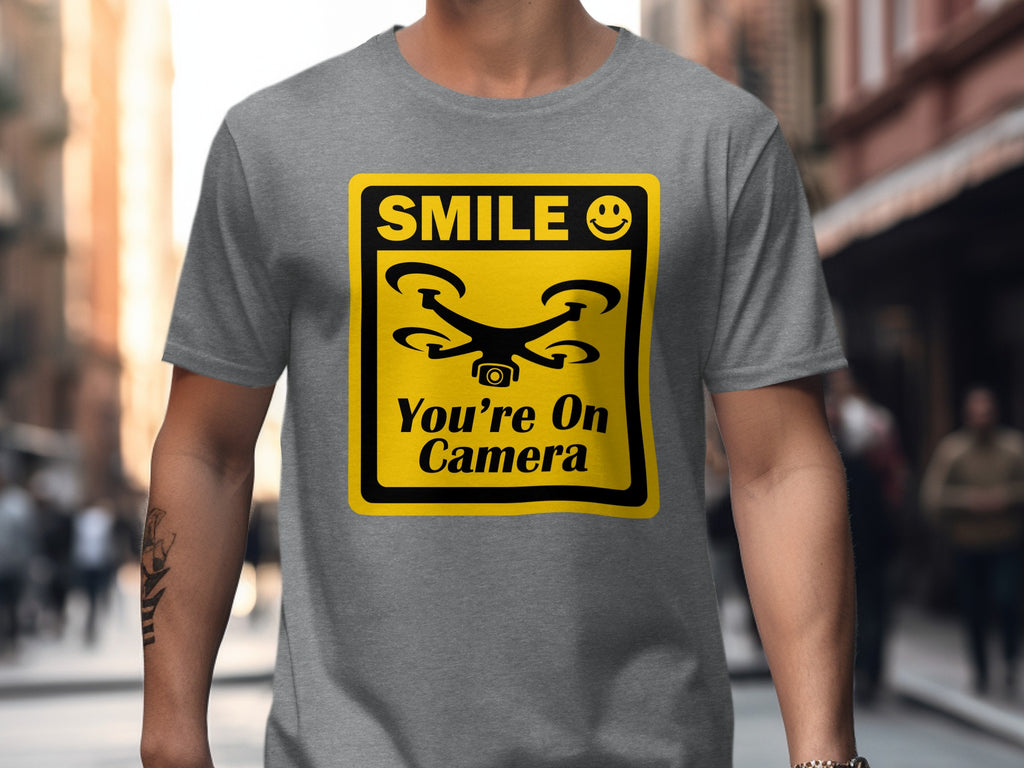 Smile You're On Camera Unisex Softstyle T-Shirt, Cute Drone Tee, Humorous Quadcopter Shirt, Great Gift for Drone Lovers