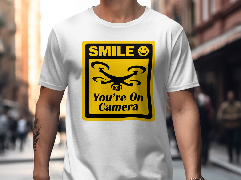 Smile You're On Camera Unisex Softstyle T-Shirt, Cute Drone Tee, Humorous Quadcopter Shirt, Great Gift for Drone Lovers