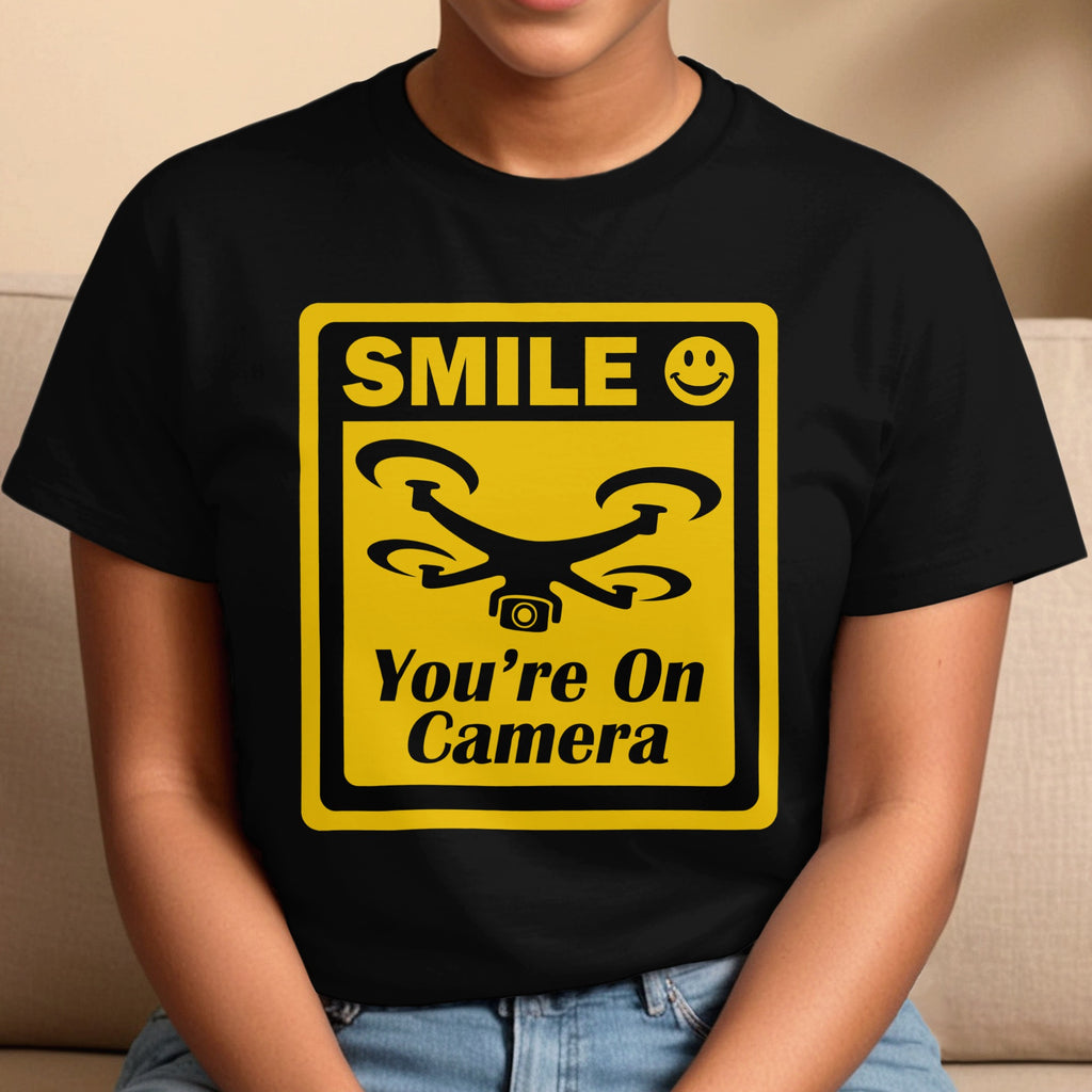 Smile You're On Camera Unisex Softstyle T-Shirt, Cute Drone Tee, Humorous Quadcopter Shirt, Great Gift for Drone Lovers